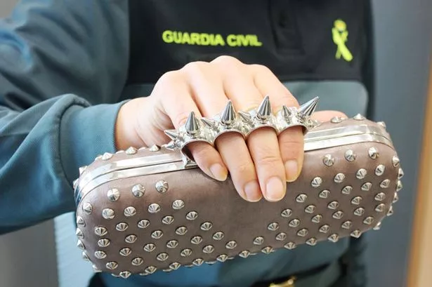 Police-seize-clutch-bags-for-being-dangerous-WEAPONS.jpg